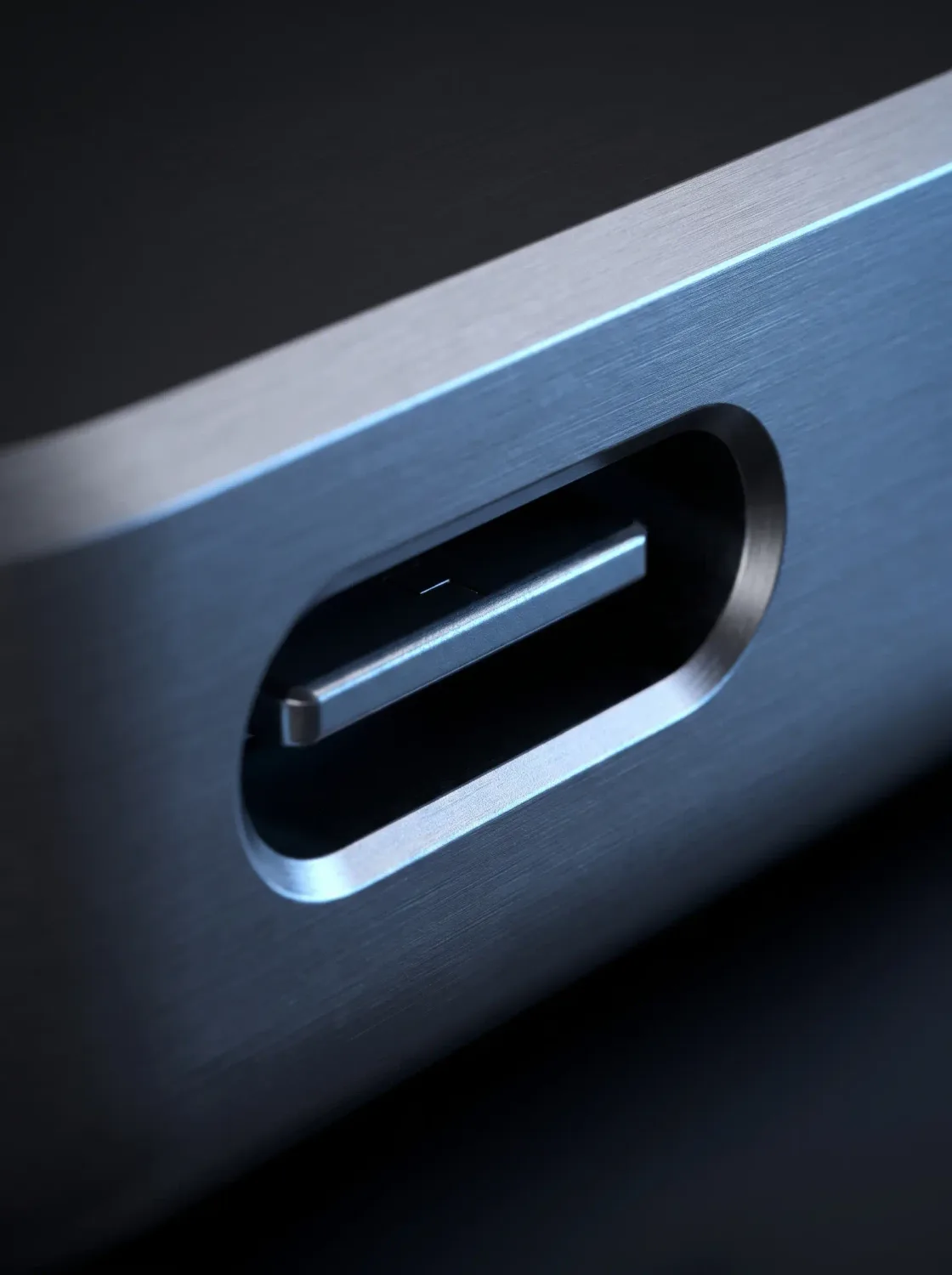 Makroaufnahme einer USB-C-Buchse in gebürstetem Aluminium